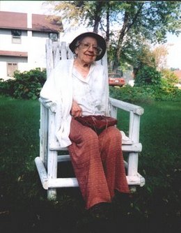 Florence in chair made by Robert out of tents poles.